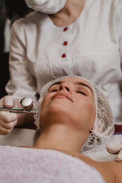 beautiful-woman-getting-cosmetic-treatment_23-2148825299.avif